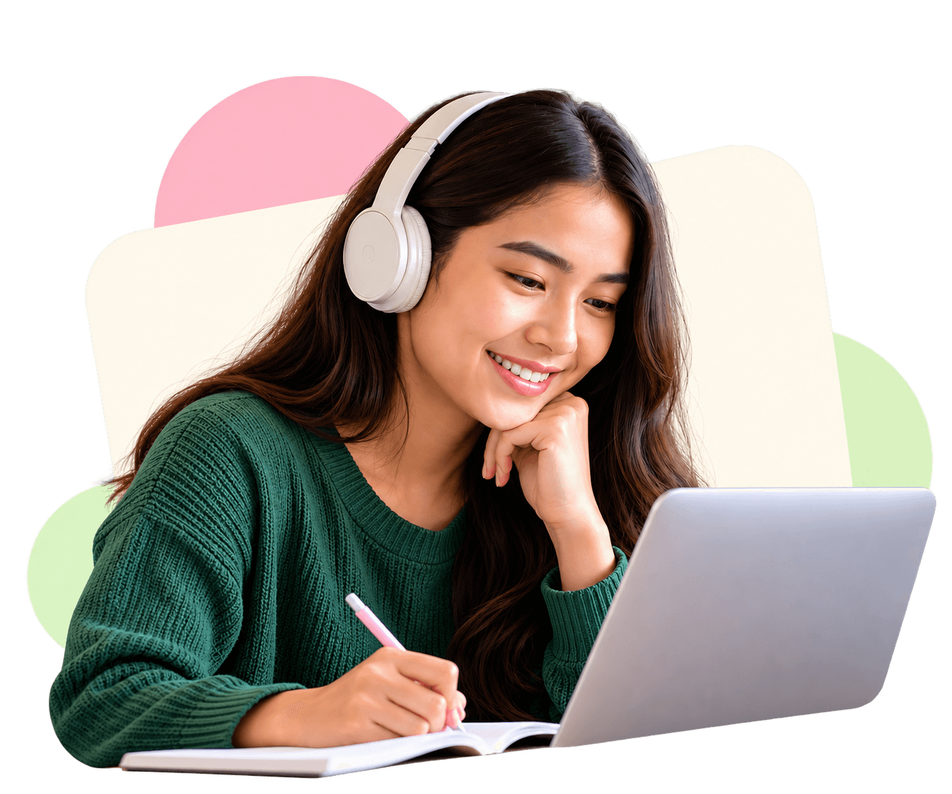 Student with headphones smiling as she takes notes at a laptop
